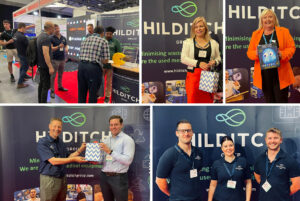 The Hilditch Group team exhibit at the EBME Expo 2024, presenting prizes to Pac-Man winners.